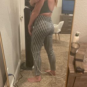 Black and white checkered pants.